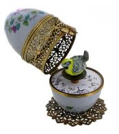 Oeufs musicaux de style Fabergé fabriqués en France Oeuf musical de style Fabergé en porcelaine de Limoges en forme de cage avec oiseau - La lettre à Elise