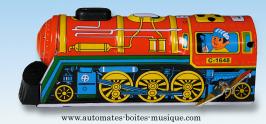 Jouets mécaniques en métal, tôle ou fer blanc Jouet mécanique en métal, tôle et fer blanc : jouet mécanique locomotive bleue et rouge