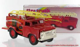 Jouets mécaniques en métal, tôle ou fer blanc Jouet mécanique en métal, tôle et fer blanc : jouet mécanique "Camion des pompiers"