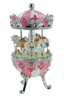 Oeufs musicaux en métal de style Fabergé Oeuf musical de style Fabergé en métal : oeuf musical rose et blanc avec chevaux de carrousel tournants