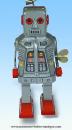 Jouet mécanique en métal, tôle et fer blanc : jouet mécanique petit robot gris