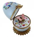 Oeuf musical de style Fabergé en porcelaine de Limoges avec papillon rose - Musique sur l'eau (Haendel)