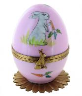 Oeufs musicaux de style Fabergé fabriqués en France Oeuf musical de style Fabergé en porcelaine avec lapin rose - La vie en rose (Louiguy / Edith Piaf)