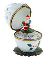 Oeufs musicaux de style Fabergé fabriqués en France Oeuf musical de style Fabergé en porcelaine de Limoges avec Père Noël - Santa Claus Is Coming to Town