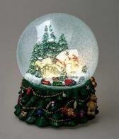 Boules à neige musicales de Noël disponibles sur commande (nous contacter) Boule à neige musicale de Noël avec globe en verre, deux maisons enneigées et train