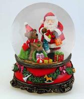 Boules à neige musicales de Noël disponibles sur commande (nous contacter) Boule à neige musicale de Noël avec globe en verre, Père Noël et cadeaux dont un ours en peluche