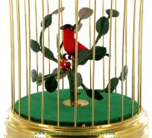 Oiseaux chanteurs automates mécaniques Oiseau chanteur mécanique : un oiseau chanteur automate dans une cage dorée