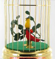 Oiseaux chanteurs automates mécaniques Oiseaux chanteurs mécaniques : 2 oiseaux chanteurs automates dans une cage dorée