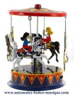Jouets mécaniques en métal, tôle ou fer blanc non disponibles Jouet mécanique en métal, tôle et fer blanc agrafé : jouet mécanique "Carrousel avec chevaux"