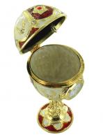 Oeufs musicaux en métal de style Fabergé Oeuf musical de style Fabergé en métal : oeuf musical marron avec montre à quartz