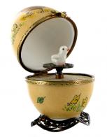 Oeufs musicaux de style Fabergé fabriqués en France Oeuf musical de style Fabergé en porcelaine de Limoges avec poussin - La valse des fleurs