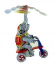 Jouet mécanique en métal, tôle et fer blanc: jouet mécanique éléphant sur tricycle