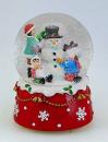 Boule à neige musicale de Noël avec globe en verre et scène d'enfants fabriquant un bonhomme de neige
