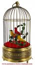 Oiseaux chanteurs mécaniques : 3 oiseaux chanteurs automates dans cage ancienne