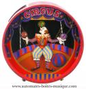 Tirelire musicale animée : tirelire musicale animée avec clown jongleur.