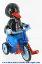 Jouet mécanique en métal, tôle et fer blanc agrafé : jouet mécanique "Pingouin à bicyclette"