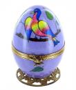 Oeuf musical de style Fabergé fabriqué en France : oeuf en porcelaine avec oiseau