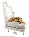 Instrument de musique miniature : piano à queue en résine avec ballerine dansante