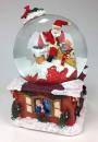 Boule à neige musicale de Noël : boule à neige de Noël en verre avec Père Noël dans la cheminée.