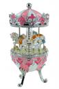 Oeuf musical de style Fabergé en métal : oeuf musical rose et blanc avec chevaux de carrousel tournants