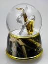 Boule à neige musicale animée avec globe en verre: boule à neige musicale scintillante avec saxophone
